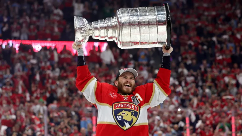 Matthew Tkachuk #19 of the Florida Panthers lifts the Stanley Cup after Florida’s 2-1 victory against the Edmonton Oilers in Game Seven of the 2024 Stanley Cup Final. (Source: Carmen Mandato/Getty Images)
