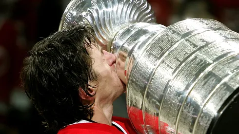 Rod Brind'Amour #17 of the Carolina Hurricanes kisses the Stanley Cup after defeating the Edmonton Oilers in game seven of the 2006 NHL Stanley Cup Finals.