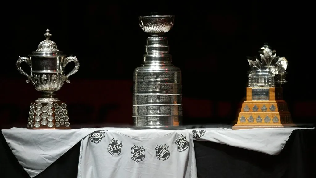 The Stanley Cup is placed between the Clarence Campbell Trophy and the Conn Smythe Trophy during a pre-game ceremony honoring the Anaheim Ducks winning the 2007 Stanley Cup. (Source: Robert Laberge/Getty Images)