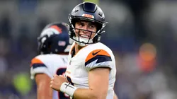 Bo Nix #10 of the Denver Broncos smiles after a touchdown during the second half of a preseason game against the Indianapolis Colts at Lucas Oil Stadium on August 11, 2024.