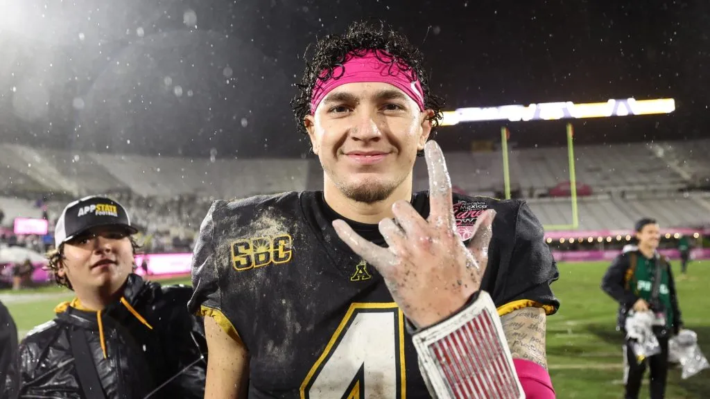 Joey Aguilar #4 of the Appalachian State Mountaineers celebrates after winning The Avocados From Mexico Cure Bowl against the Miami (Oh) Redhawks at FBC Mortgage Stadium on December 16, 2023 in Orlando, Florida.
