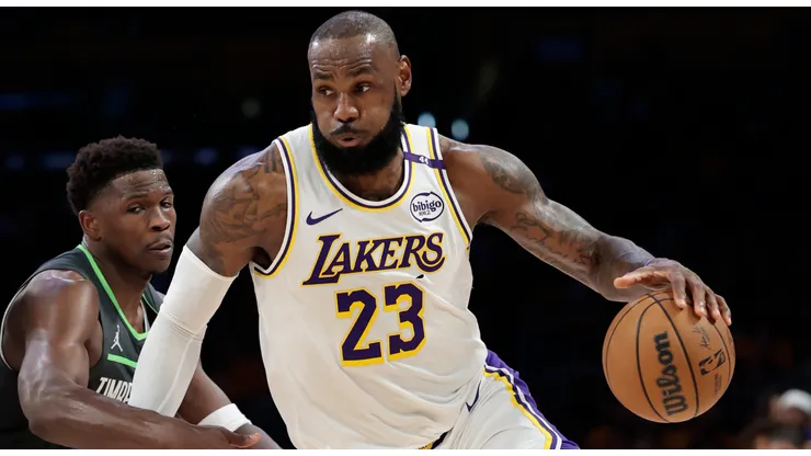 LeBron James #23 of the Los Angeles Lakers drives to the basket against Anthony Edwards #5 of the Minnesota Timberwolves during the first quarter in Game One of the Western Conference First Round NBA Playoffs at Crypto.com Arena on April 19, 2025 in Los Angeles, California.