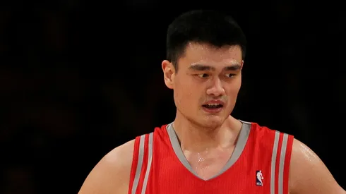 Yao Ming #11 of the Houston Rockets looks on during their opening night game against the Los Angeles Lakers.