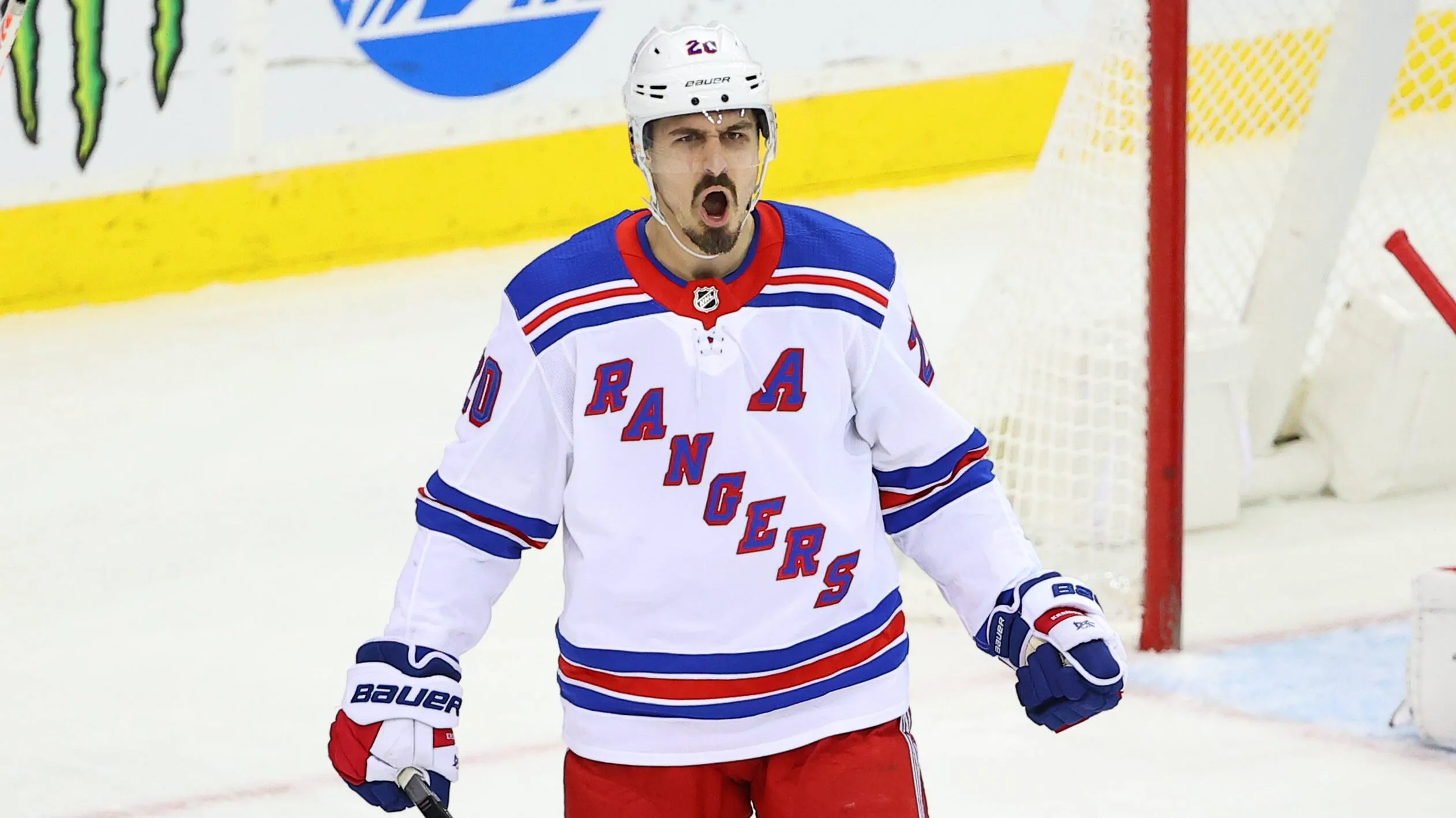 Chris Kreider 20 celebrates after scoring during the National Hockey League game