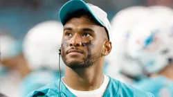Tua Tagovailoa #1 of the Miami Dolphins looks on during a preseason game against the Atlanta Falcons at Hard Rock Stadium on August 21, 2021 in Miami Gardens, Florida.