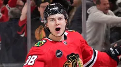 Connor Bedard #98 of the Chicago Blackhawks celebrates after scoring the game winning goal during overtime against the Winnipeg Jets at the United Center on December 27, 2023 in Chicago, Illinois.
