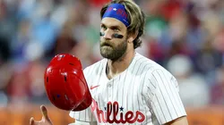 Bryce Harper #3 of the Philadelphia Phillies tosses his helmet on second base in the seventh inning against the San Francisco Giants at Citizens Bank Park on April 14, 2025.
