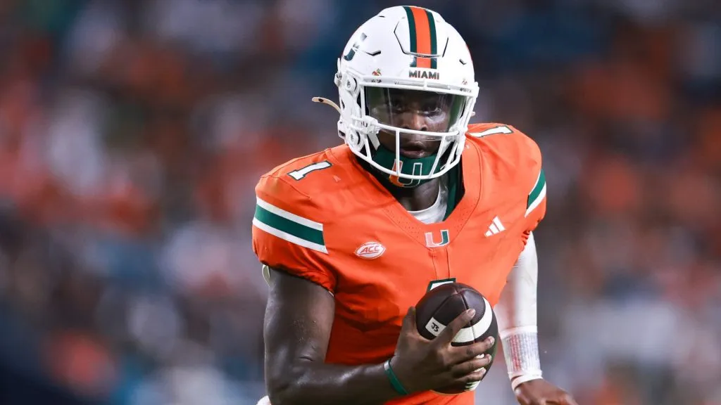 Quarterback Cam Ward #1 of the Miami Hurricanes rushes for a touchdown against the Florida A&M Rattlers during the second half at Hard Rock Stadium on September 07, 2024. (Source: Carmen Mandato/Getty Images)