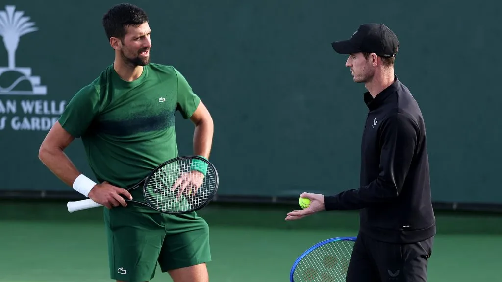 Novak Djokovic of Serbia and his coach Andy Murray working on his serve during a practice session at the BNP Paribas Open at Indian Wells. (Clive Brunskill/Getty Images)