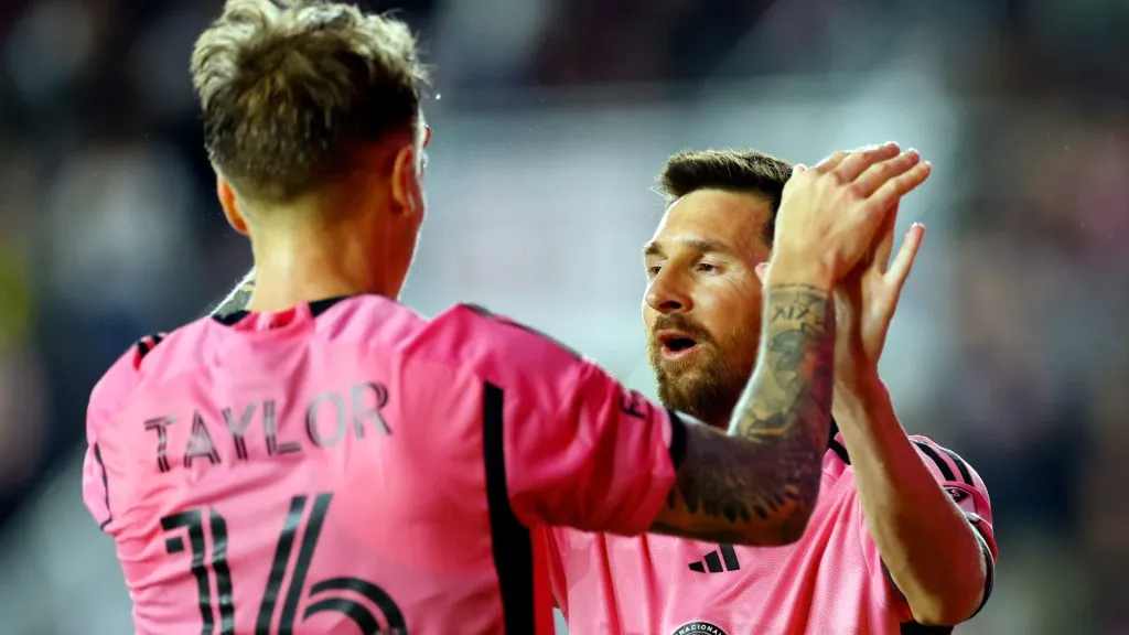 Lionel Messi #10 celebrates with Robert Taylor #16 of Inter Miami after Taylor’s goal scored during the first half against Real Salt Lake at Chase Stadium. (Mike Ehrmann/Getty Images)