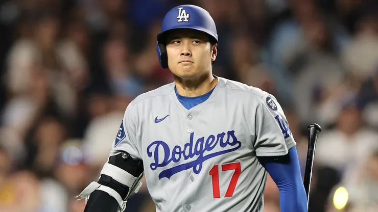 Shohei Ohtani #17 of the Los Angeles Dodgers reacts after striking out during the ninth inning against the Chicago Cubs at Wrigley Field on April 23, 2025 in Chicago, Illinois.