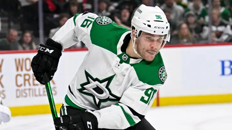 Tyler Seguin #91 of the Dallas Stars skates with the puck in the second period of the game against the Minnesota Wild.