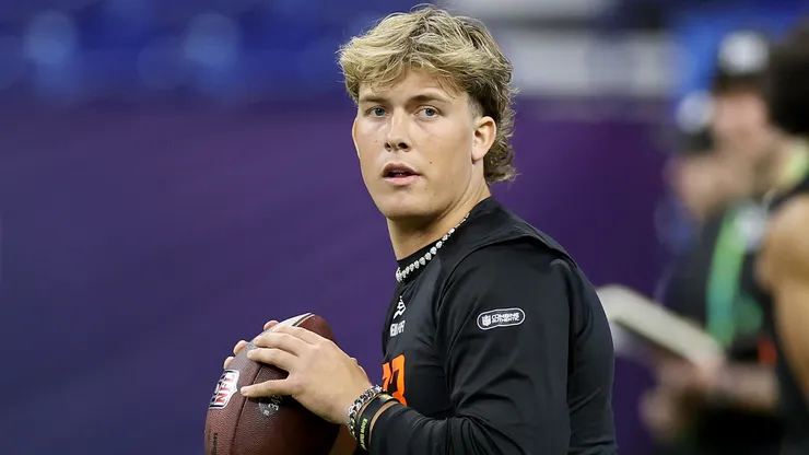 Jaxson Dart #QB03 of Mississippi participates in a drill during the NFL Scouting Combine at Lucas Oil Stadium on March 01, 2025.