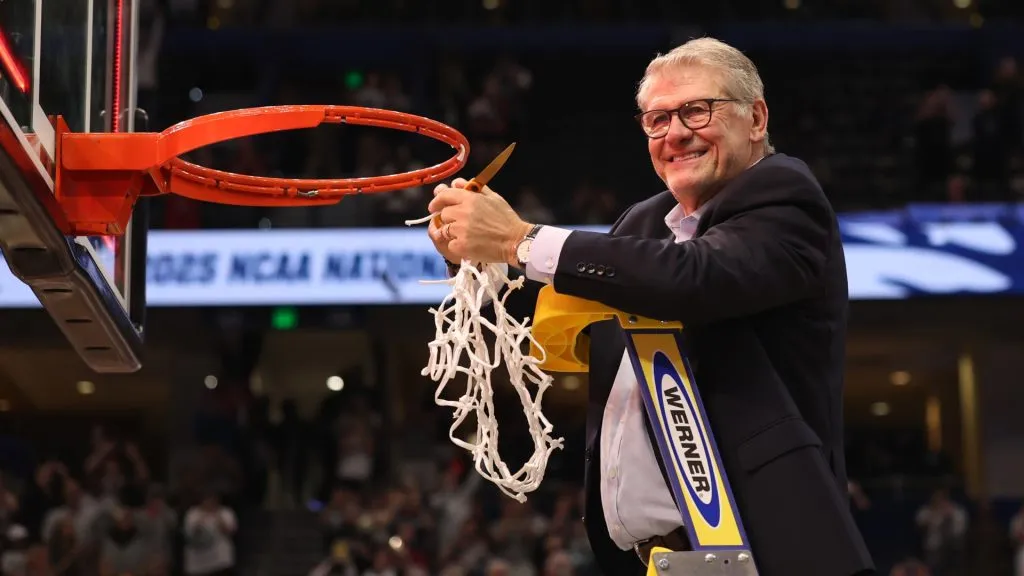 Geno Auriemma celebrates with the net after beating the South Carolina Gamecocks 82-59 to win the National Championship of the NCAA Women’s Basketball Tournament. (Source: Maddie Meyer/Getty Images)