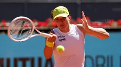 Iga Swiatek of Poland plays a forehand.