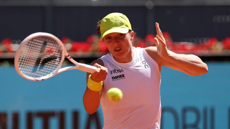 Iga Swiatek of Poland plays a forehand.