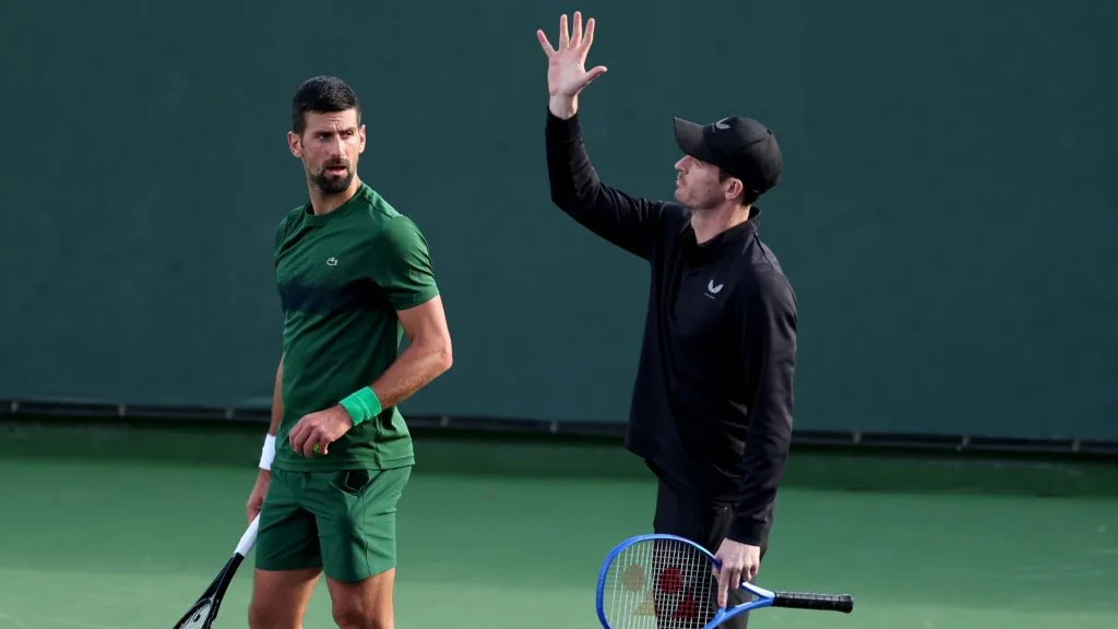Novak Djokovic of Serbia and his coach Andy Murray working on his serve during a practice session at the BNP Paribas Open at Indian Wells. (Clive Brunskill/Getty Images)
