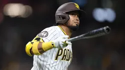 Luis Arraez #4 of the San Diego Padres reacts after hitting a solo homerun during the eighth inning of a game against the Chicago Cubs.