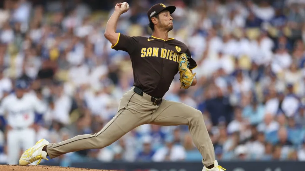 Yu Darvish #11 of the San Diego Padres pitches the ball against the Los Angeles Dodgers during the first inning of Game Five of the Division Series at Dodger Stadium on October 11, 2024. (Photo by Harry How/Getty Images)