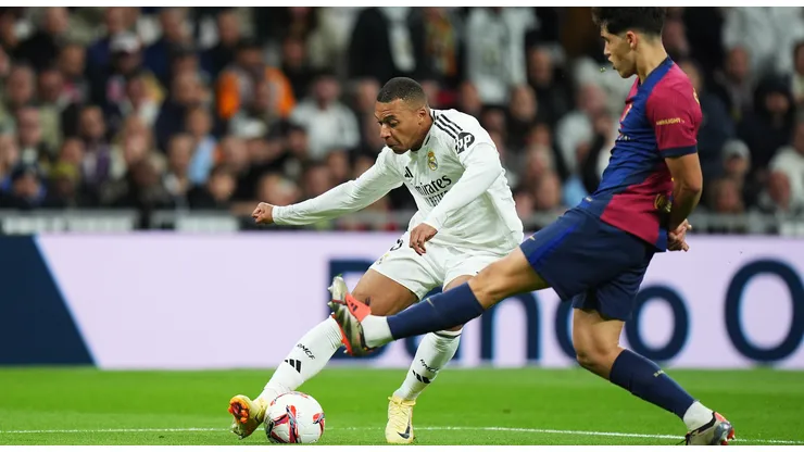 Kylian Mbappe of Real Madrid and Pau Cubarsi of FC Barcelona