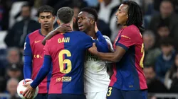 Barcelona and Real Madrid players having a heated argument during a La Liga game