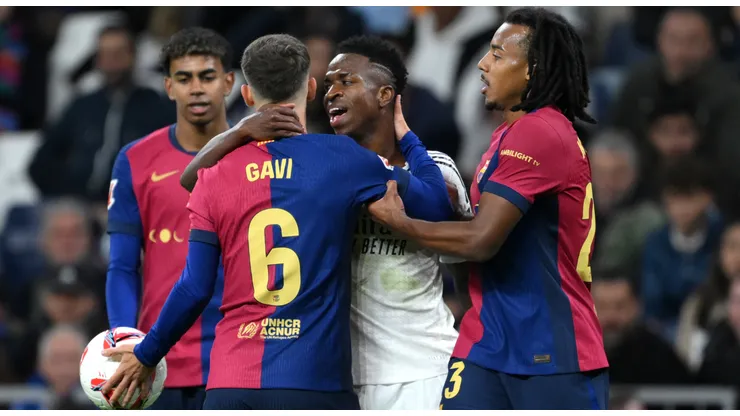 Barcelona and Real Madrid players having a heated argument during a La Liga game