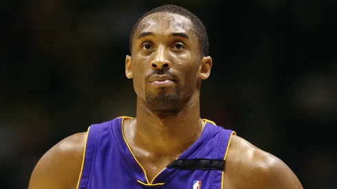 Kobe Bryant #8 of the Los Angeles Lakers looks at the clock during the NBA game against the New Jersey Nets at Continental Airlines Arena on December 19, 2002 in East Rutherford, New Jersey. The Nets won 98-71.