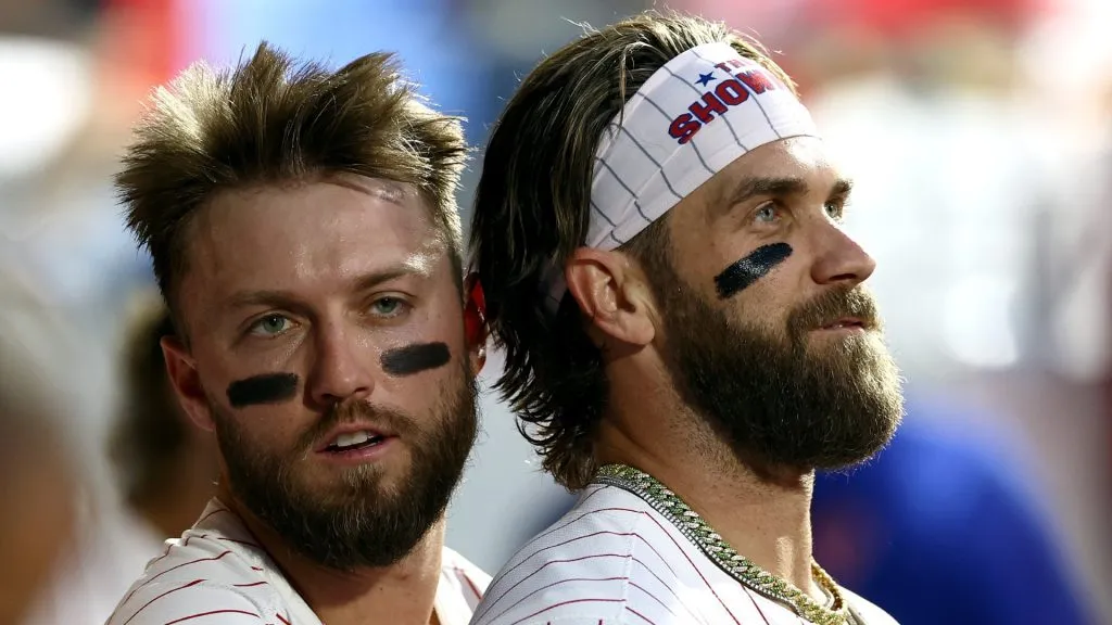 Bryce Harper #3 and Kody Clemens #2 of the Philadelphia Phillies look on during the fourth inning against the Toronto Blue Jays
