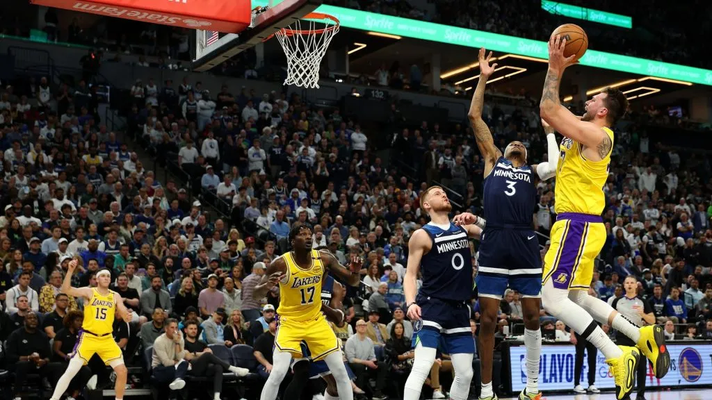 Luka Doncic #77 of the Los Angeles Lakers shoots the ball against Jaden McDaniels #3 of the Minnesota Timberwolves in the first quarter of Game Three of the First Round of the 2025 NBA Playoffs at Target Center on April 25, 2025 in Minneapolis, Minnesota. (Photo by David Berding/Getty Images)