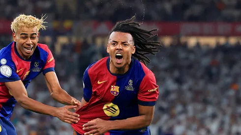 Jules Kounde of FC Barcelona celebrates scoring his team's third goal with Lamine Yamal during the Copa del Rey Final match between FC Barcelona and Real Madrid