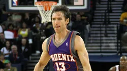 Steve Nash #13 of the Phoenix Suns dribbles the ball against the Golden State Warriors during an NBA game