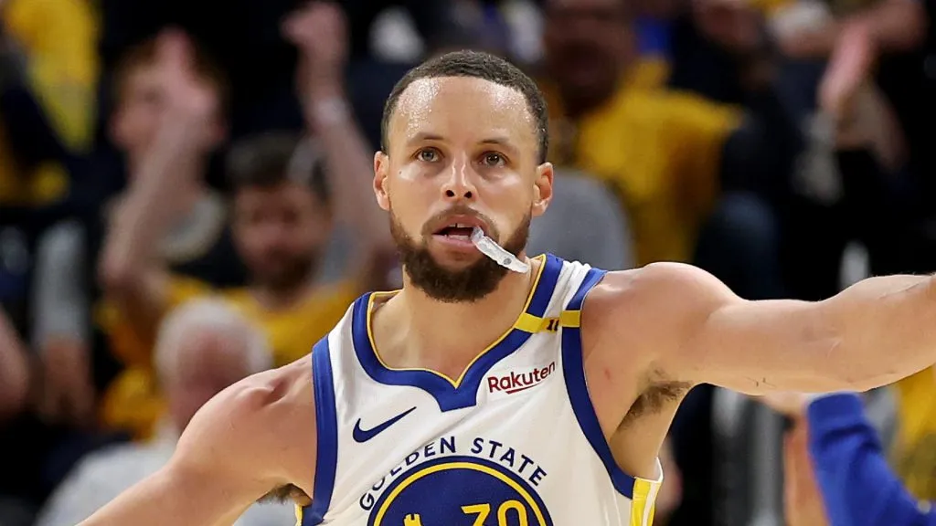 Stephen Curry #30 of the Golden State Warriors reacts after making a three point basket during the third quarter in Game Three of the Western Conference First Round NBA Playoffs against the Houston Rockets