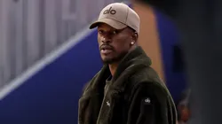 Jimmy Butler III #10 of the Golden State Warriors looks on from the bench during the first half in Game Three of the Western Conference First Round NBA Playoffs against the Houston Rockets at Chase Center on April 26, 2025 in San Francisco, California.|