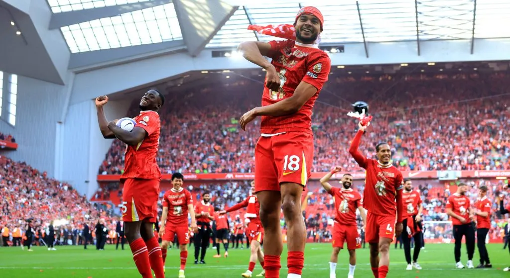 Ibrahima Konate and Cody Gakpo celebrating the Premier League title.