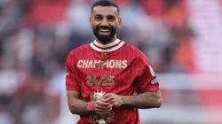 Mohamed Salah of Liverpool celebrates the teams victory and confirmation of winning the Premier League title after the Premier League match between Liverpool FC and Tottenham Hotspur FC at Anfield on April 27, 2025 in Liverpool, England.