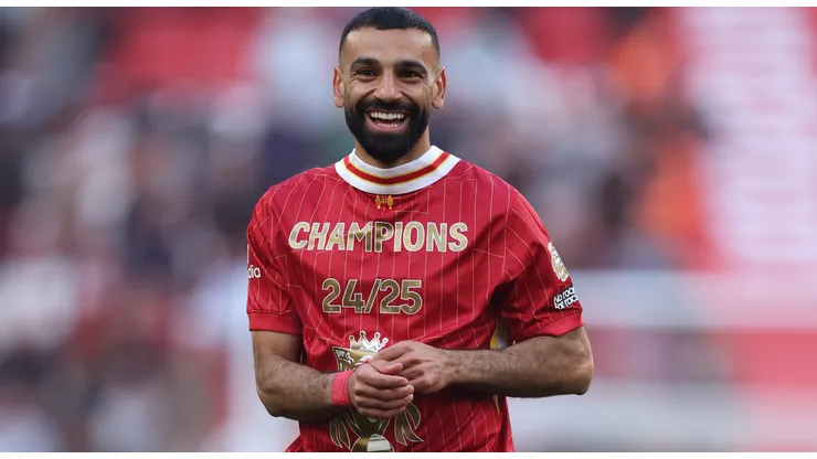 Mohamed Salah of Liverpool celebrates the teams victory and confirmation of winning the Premier League title after the Premier League match between Liverpool FC and Tottenham Hotspur FC at Anfield on April 27, 2025 in Liverpool, England.