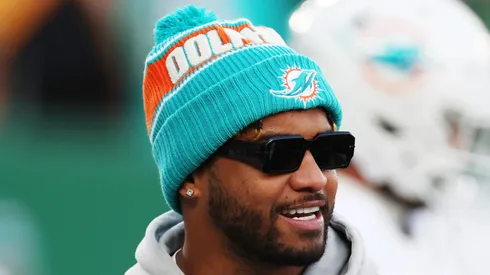 Tua Tagovailoa #1 of the Miami Dolphins looks on before the game against the New York Jets at MetLife Stadium on January 05, 2025 in East Rutherford, New Jersey.