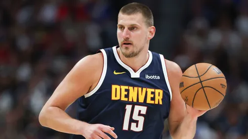 Nikola Jokic #15 of the Denver Nuggets brings the ball up the court during the first quarter against the Los Angeles Clippers.