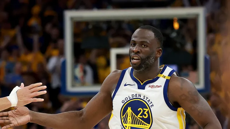 Stephen Curry #30 and Draymond Green #23 of the Golden State Warriors celebrate during the fourth quarter against the Houston Rockets