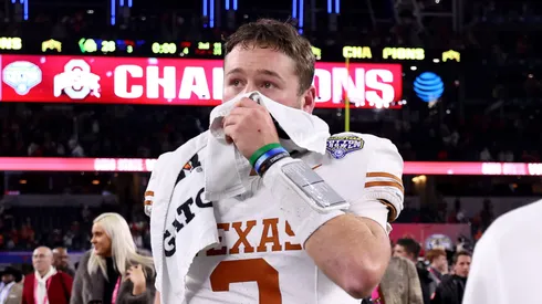 Quinn Ewers #3 of the Texas Longhorns walks off the field after losing to the Ohio State Buckeyes 28-14 in the Goodyear Cotton Bowl at AT&T Stadium on January 10, 2025 in Arlington, Texas.