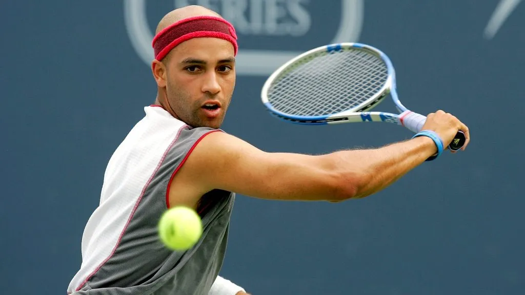 James Blake returns a backhand to Filippo Volandri of Italy during the Pilot Pen Tennis tournament August 24, 2005. (Source: Matthew Stockman/Getty Images)
