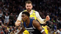 Anthony Edwards #5 of the Minnesota Timberwolves drives to the basket against Luka Doncic #77 of the Los Angeles Lakers in the third quarter of Game Three of the First Round of the 2025 NBA Playoffs at Target Center on April 25, 2025 in Minneapolis, Minnesota. The Timberwolves defeated the Lakers 116-104 to take a 2-1 series lead.