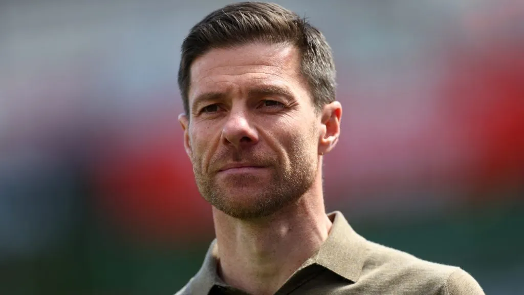 Xabi Alonso, Head Coach of Bayer 04 Leverkusen, looks on prior to the Bundesliga match between Bayer 04 Leverkusen and FC Augsburg at BayArena on April 26, 2025. (Source: Lars Baron/Getty Images)