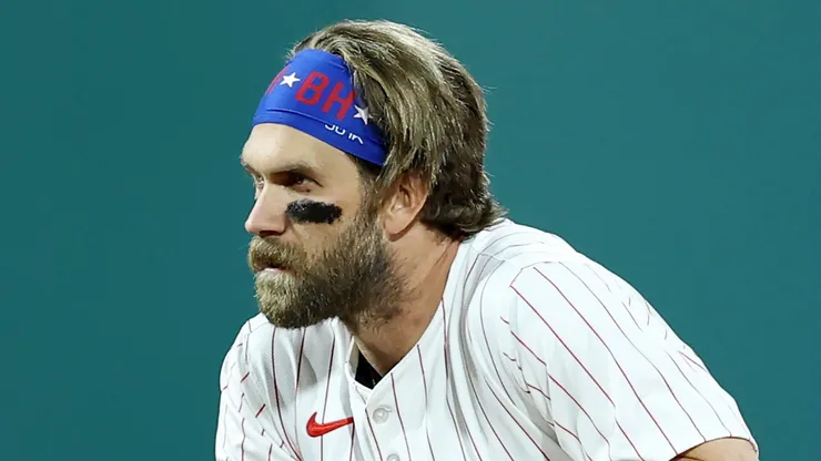 Bryce Harper #3 of the Philadelphia Phillies kneels on second base in the seventh inning against the San Francisco Giants at Citizens Bank Park on April 14, 2025 in Philadelphia, Pennsylvania.