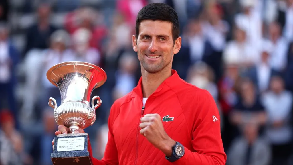 Novak Djokovic celebrates victory over Stefanos Tsitsipas in 2022 Rome Open.