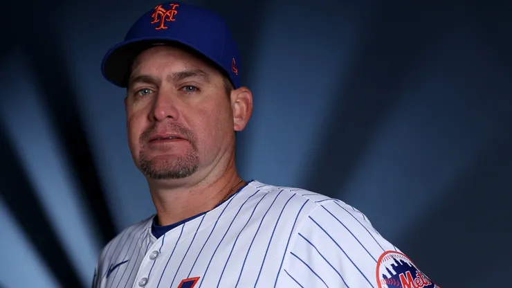 Manager Carlos Mendoza #28 of the New York Mets poses for a portrait on New York Mets Photo Day at Clover Park on February 22, 2024.