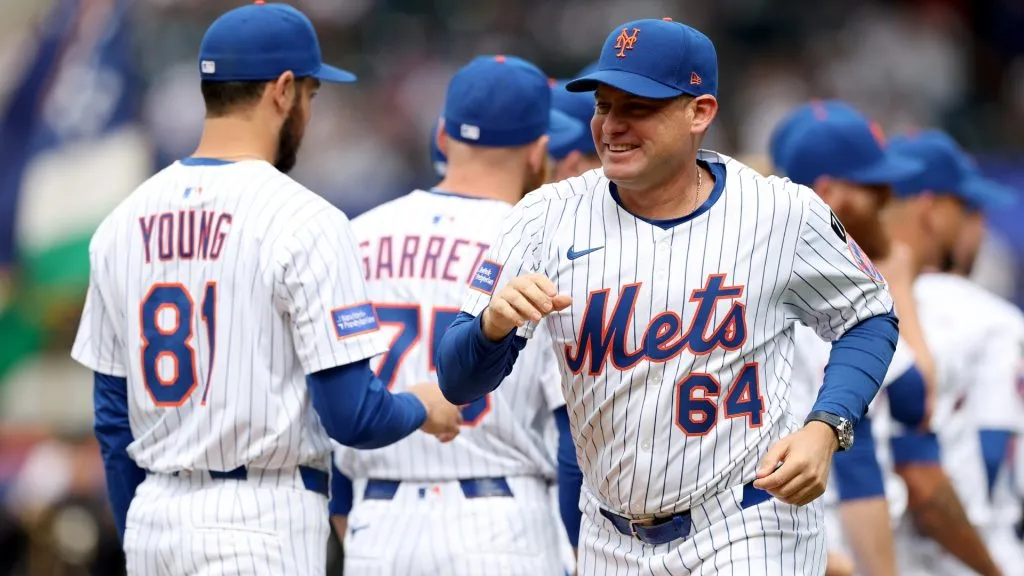 Manager Carlos Mendoza #64 of the New York Mets runs out during introductions before the home opener against the Toronto Blue Jays at Citi Field on April 04, 2025. (Source: Elsa/Getty Images)