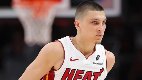 Tyler Herro #14 of the Miami Heat reacts after a basket against the Atlanta Hawks during the fourth quarter of an NBA play-in tournament game on April 18, 2025 in Atlanta, Georgia.