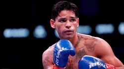 Ryan Garcia looks on while facing Oscar Duarte.