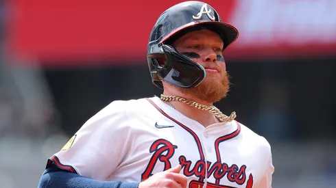 Alex Verdugo #8 of the Atlanta Braves advances to third base on a RBI single by Austin Riley #27 in the second inning against the Minnesota Twins at Truist Park on April 20, 2025 in Atlanta, Georgia.
